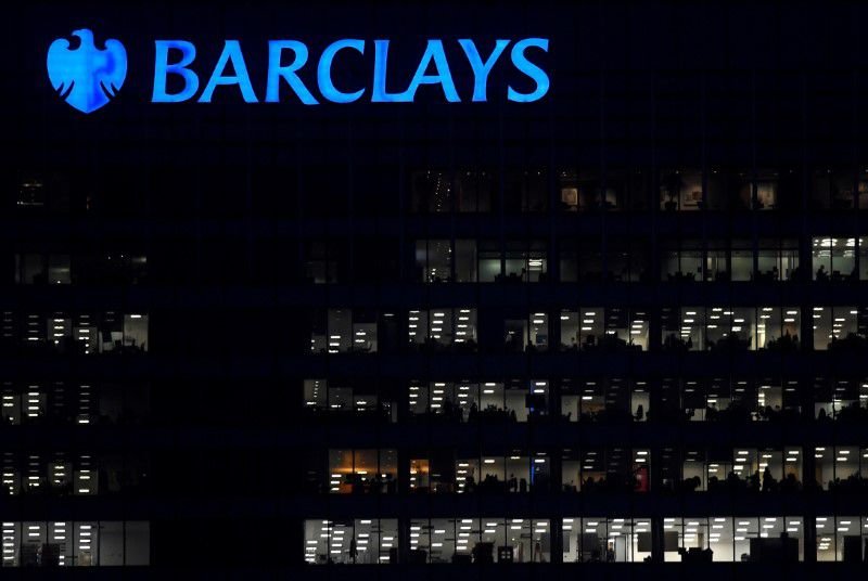 FILE PHOTO: Workers are seen in at Barclays bank offices in the Canary Wharf financial district in London, Britain, November 17, 2017. Picture taken November 17, 2017. REUTERS/Toby Melville