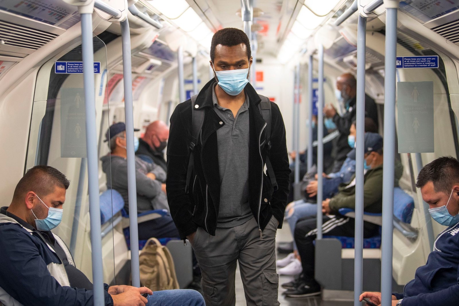 15 June 2020, England, London: Passengers wear face masks on the Jubilee Line in East London as face coverings become mandatory on public transport in England with the easing of further lockdown restrictions during the coronavirus pandemic. Photo: Victoria Jones/PA Wire/dpa