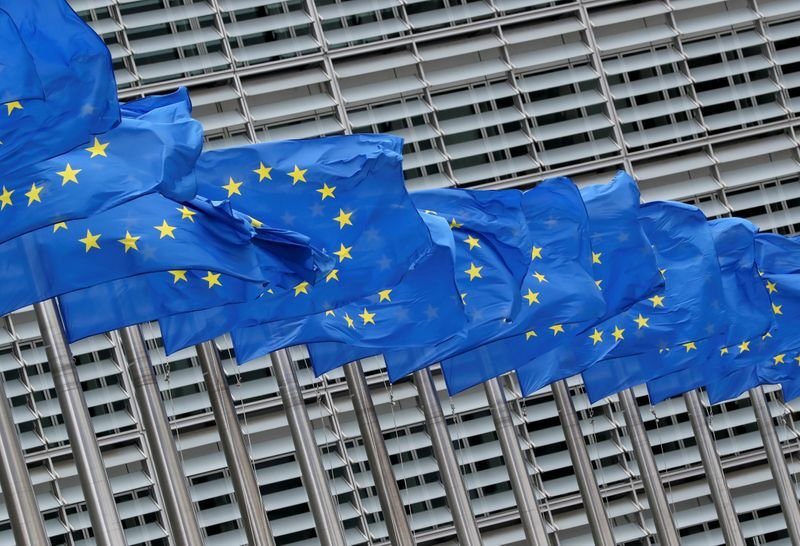 FILE PHOTO: European Union flags flutter outside the European Commission headquarters in Brussels, Belgium, June 5, 2020.  REUTERS/Yves Herman/File Photo